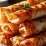 Cigares Croustillants aux Crevettes et Ail, apéritif délicieux et croustillant.