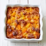 Clafoutis aux abricots frais, un dessert français classique et délicieux.